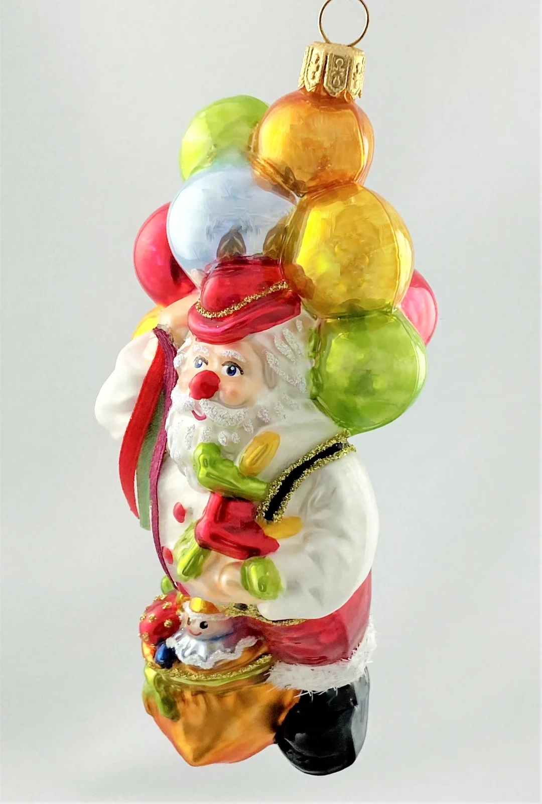 Glassware Santa hat sich als Clown verkleidet