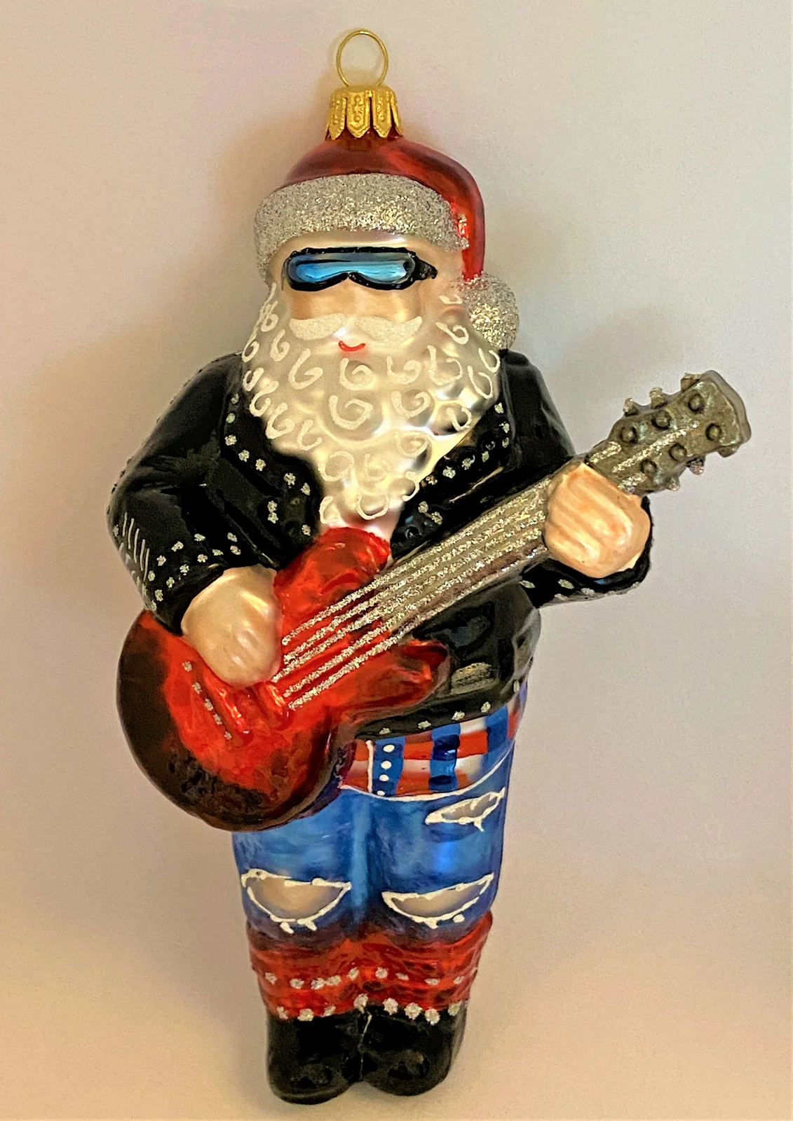 Impuls Santa Claus spielt die elektrische Gitarre