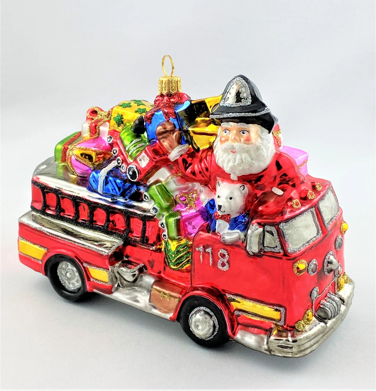 Glassware Der Weihnachtsmann bringt die Geschenke mit dem Feuerwehrauto