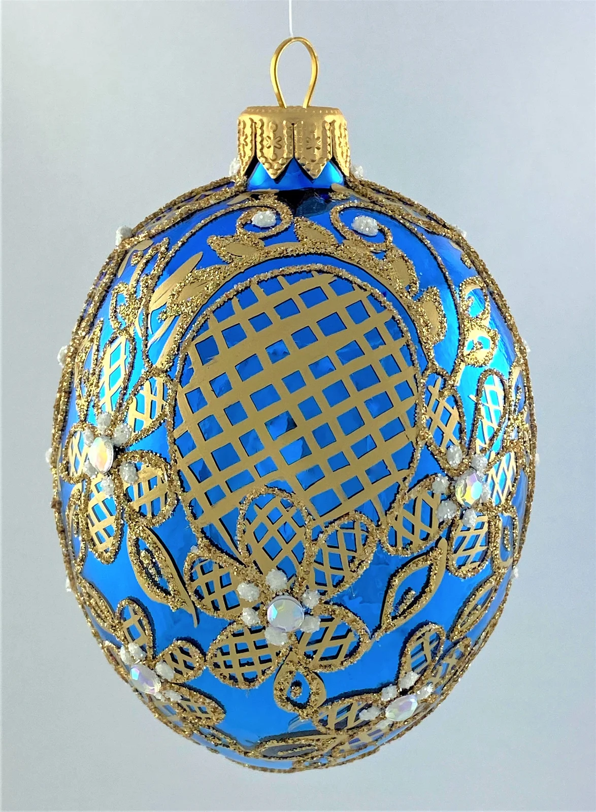 Dagmara Faberge-Ei glänzend blau mit üppigem Gold-Dekor