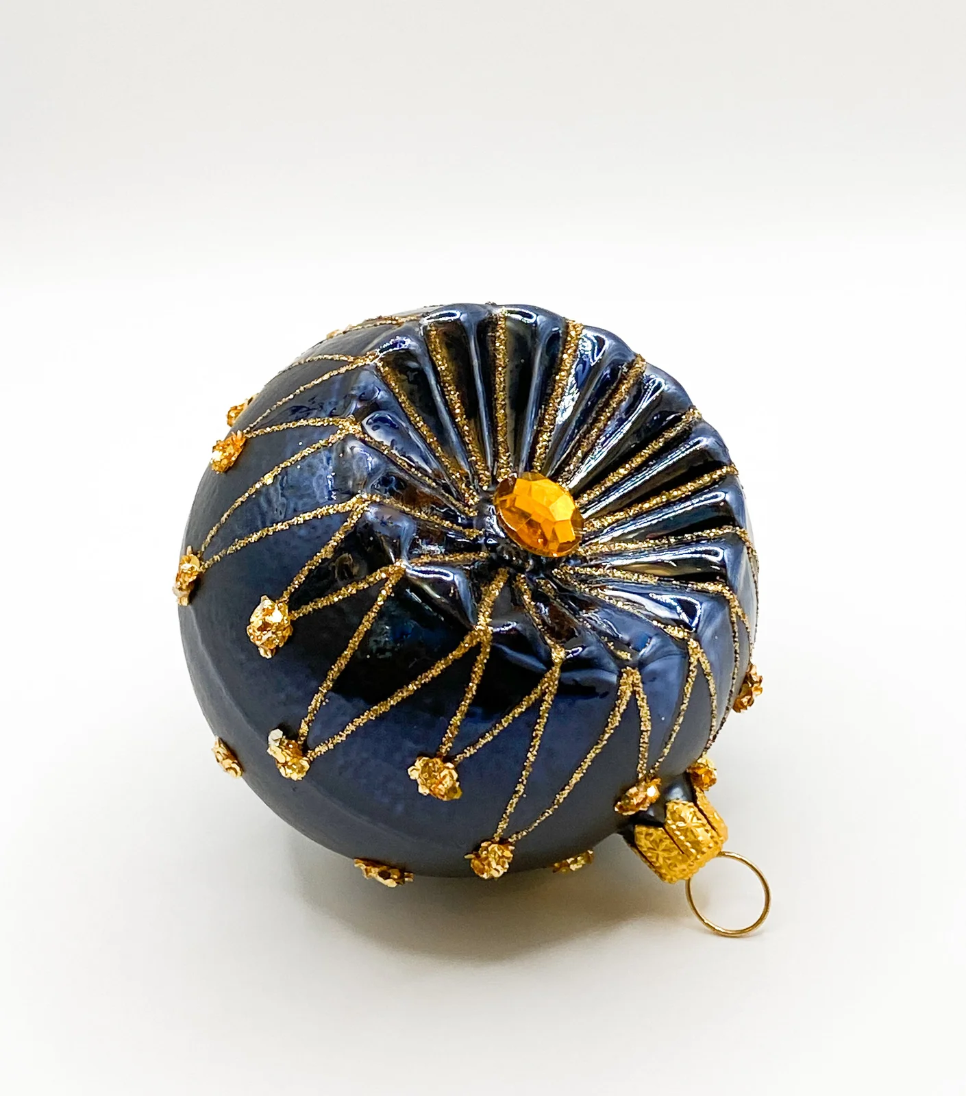 GMC Dunkelblaue Kugel mit goldenem Sternendekor