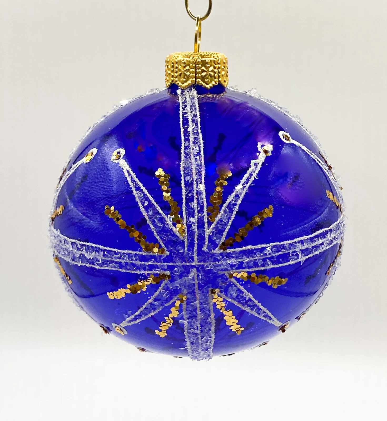 GMC Transparente blaue Kugel mit weissem und goldenem Sternendekor