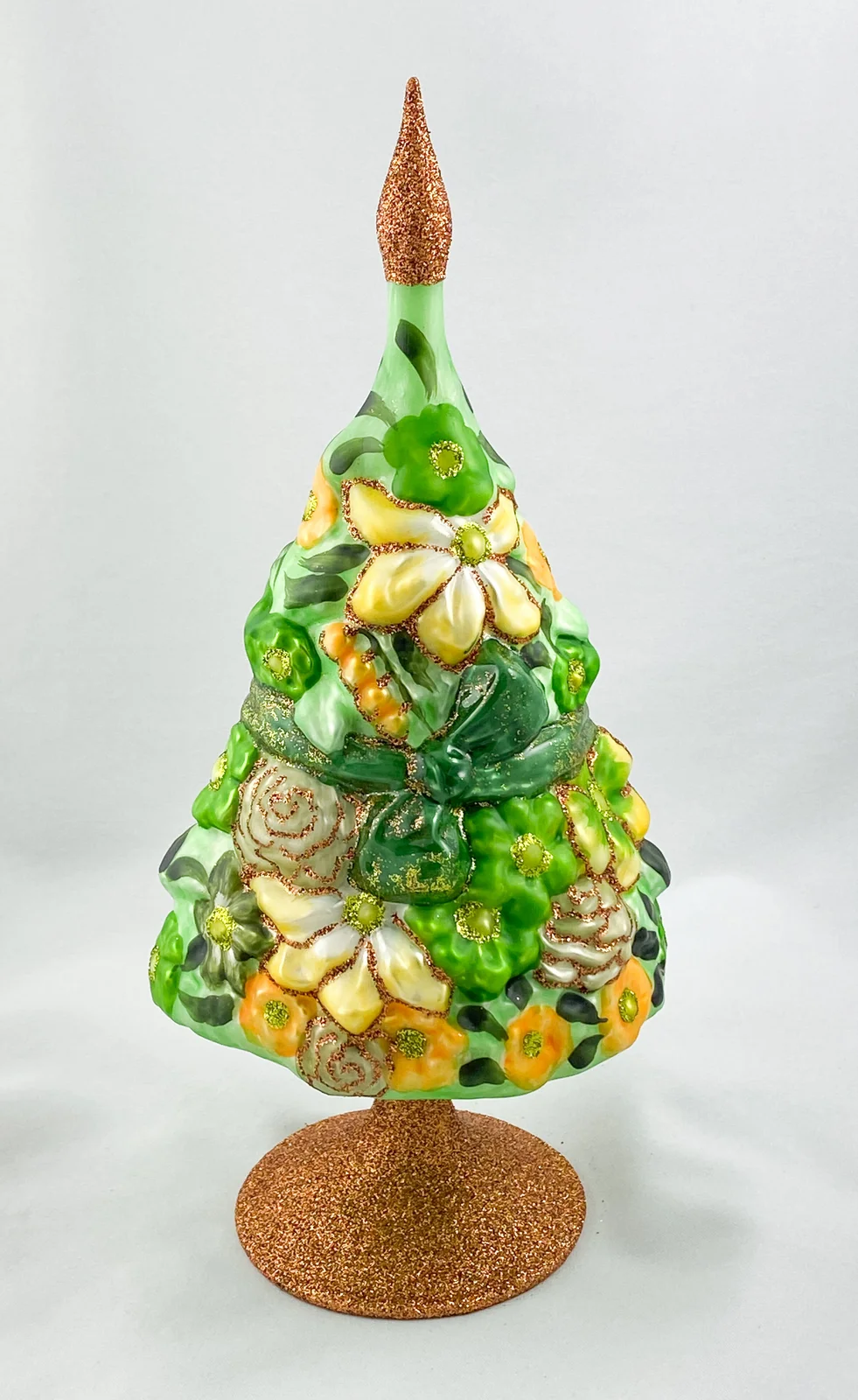 Wiktoria Sommer-Blumenbaum mit grüner Schleife und vielen Blüten