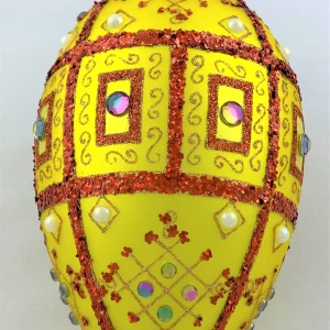 GMC Grosses Faberge-Ei gelb matt mit rotem Glitzer-Dekor und irisierenden Schmucksteinen