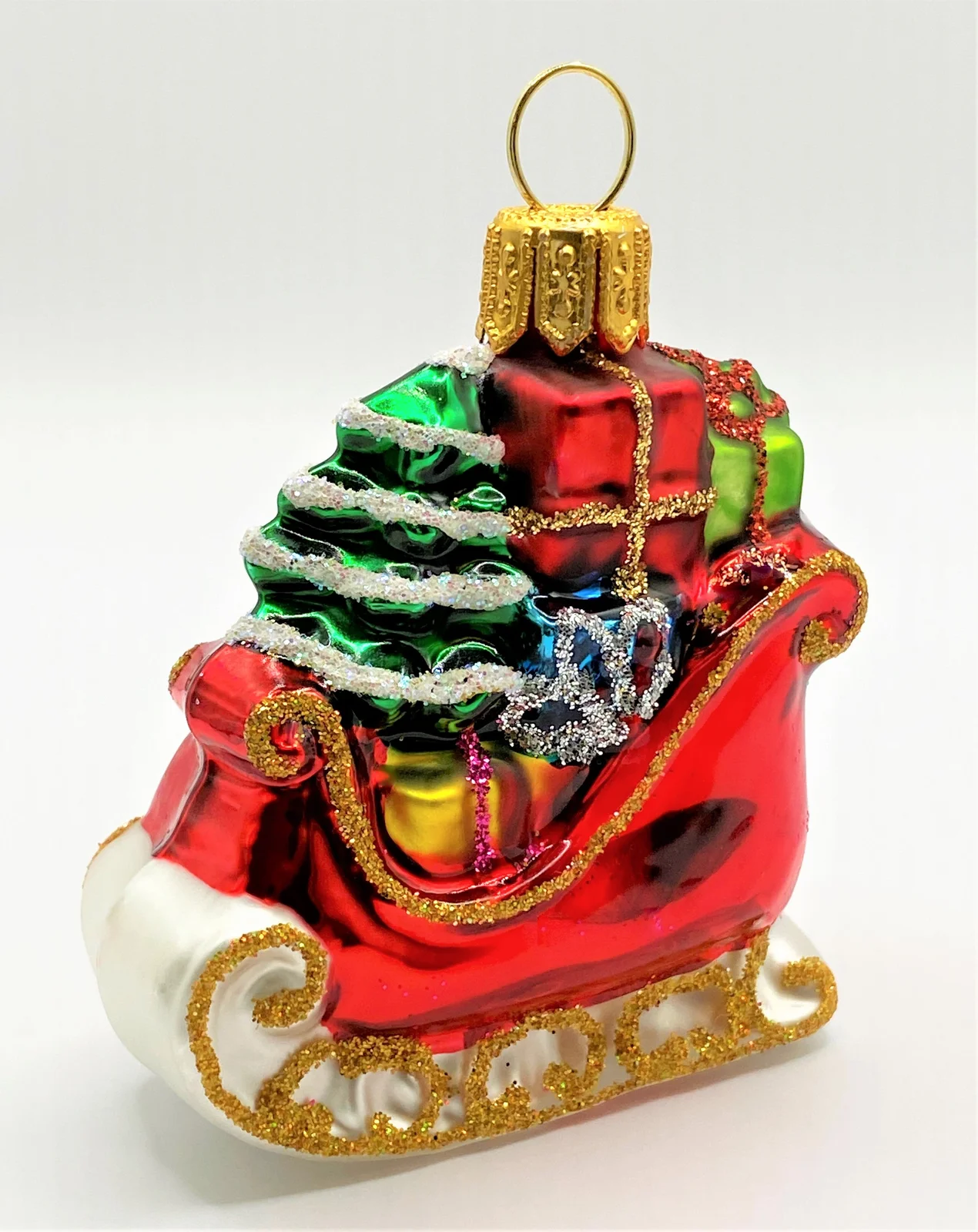 Glaspol Kleiner Weihnachtsbaum im roten Schlitten