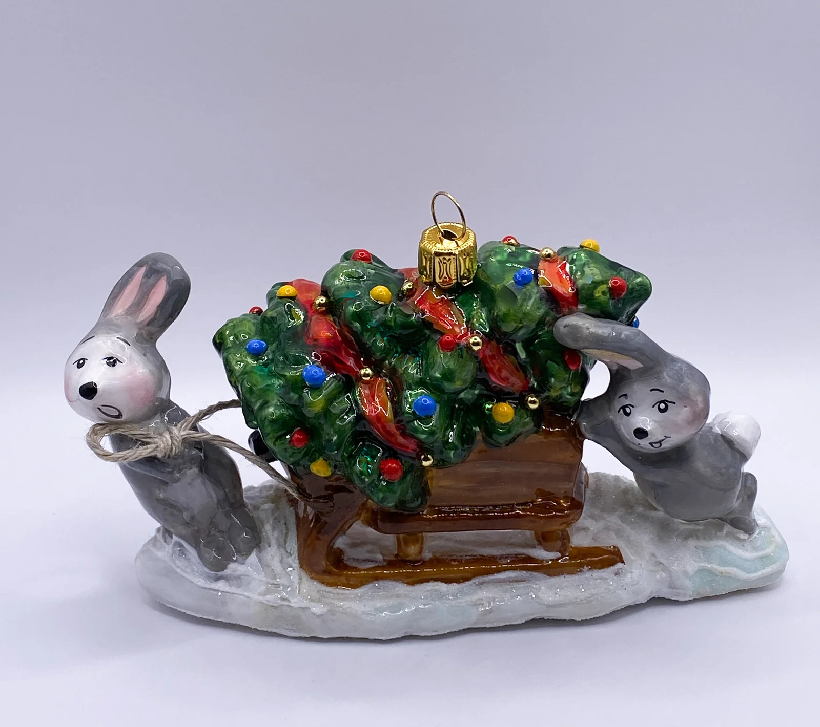 Komozja Die Häschen transportieren den Weihnachtsbaum auf dem Schlitten, KOMOZJA MOSTOWSKI