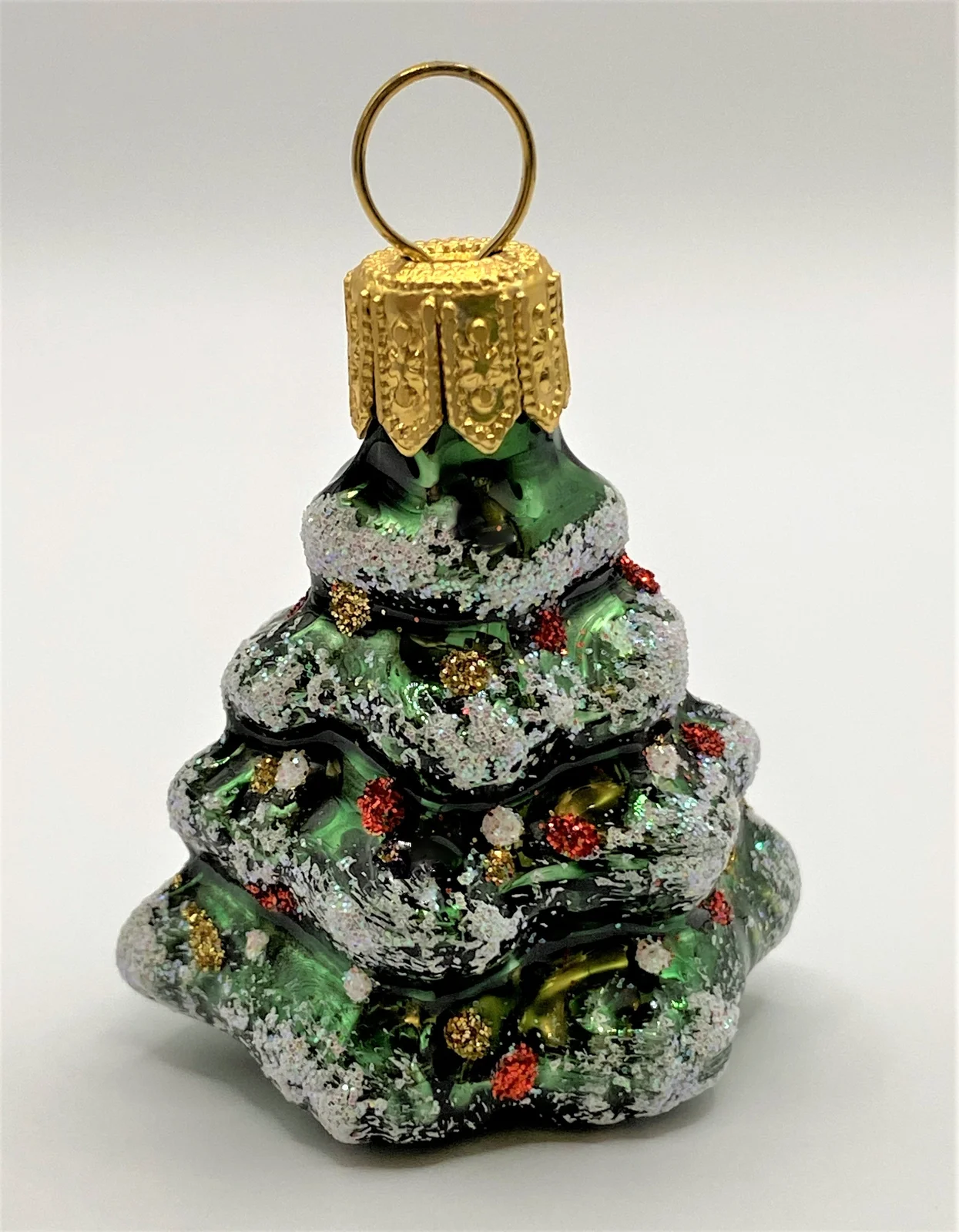 Glaspol Kleiner dunkelgrüner verschneiter Weihnachtsbaum