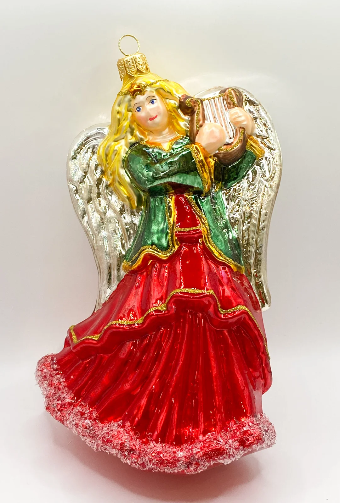 Glassware Engel im roten Kleid spielt die Lyra