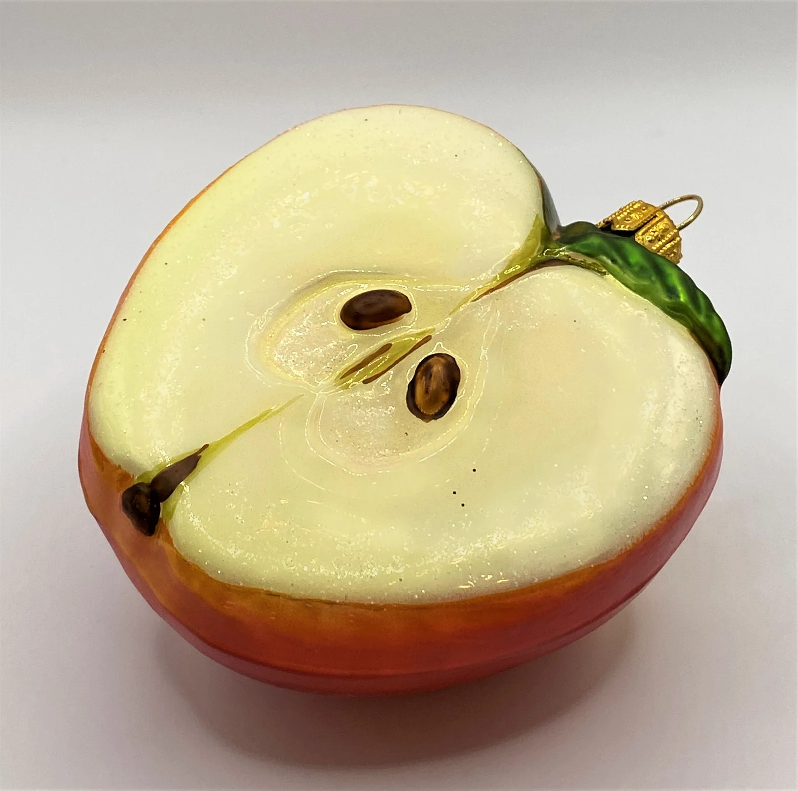 Impuls Halber roter Apfel mit Apfelkernen