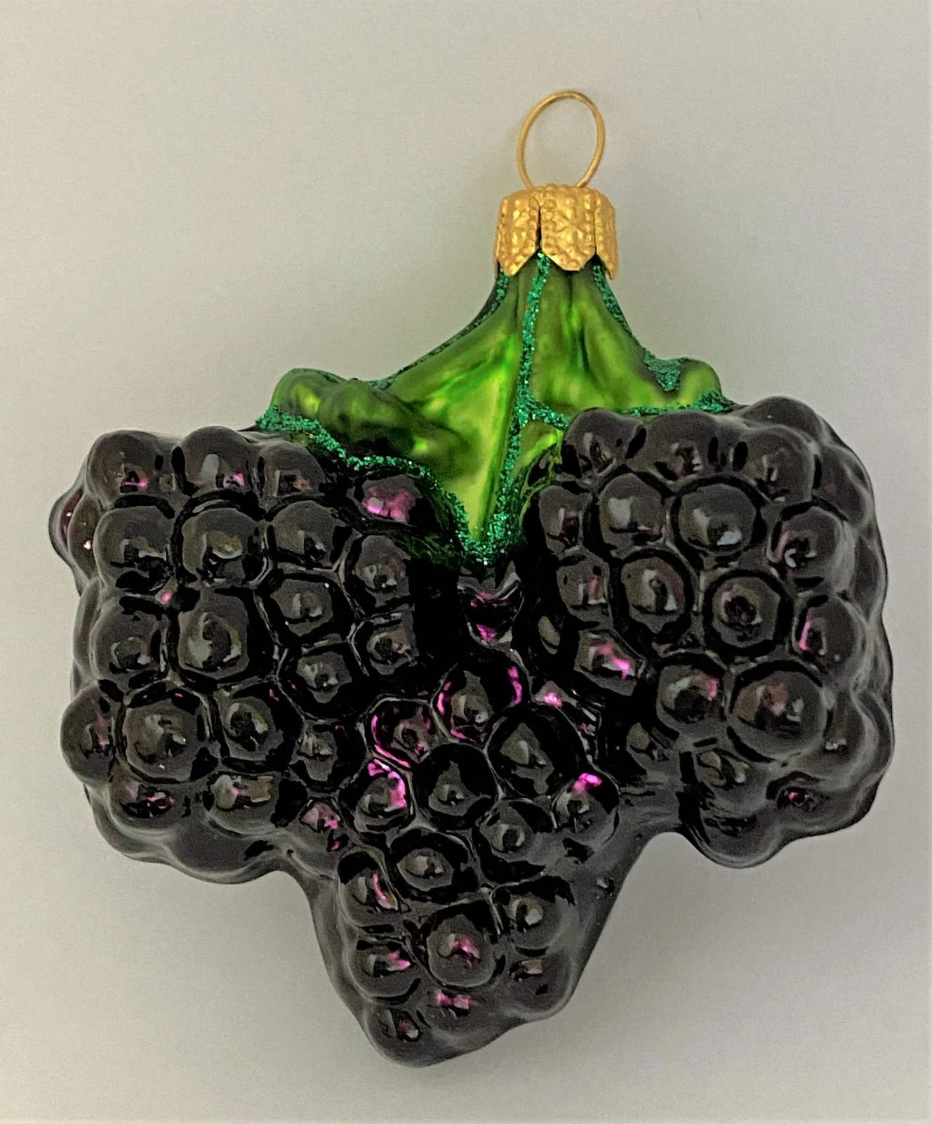 Glasswitch Glänzende Brombeeren am Zweig