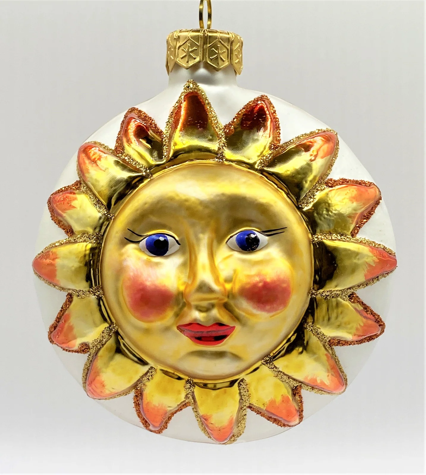 Glaspol Sonne mit Gesicht