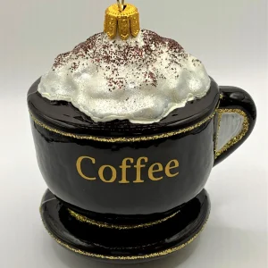 Impuls Kaffee mit Schlagsahn in brauner Tasse