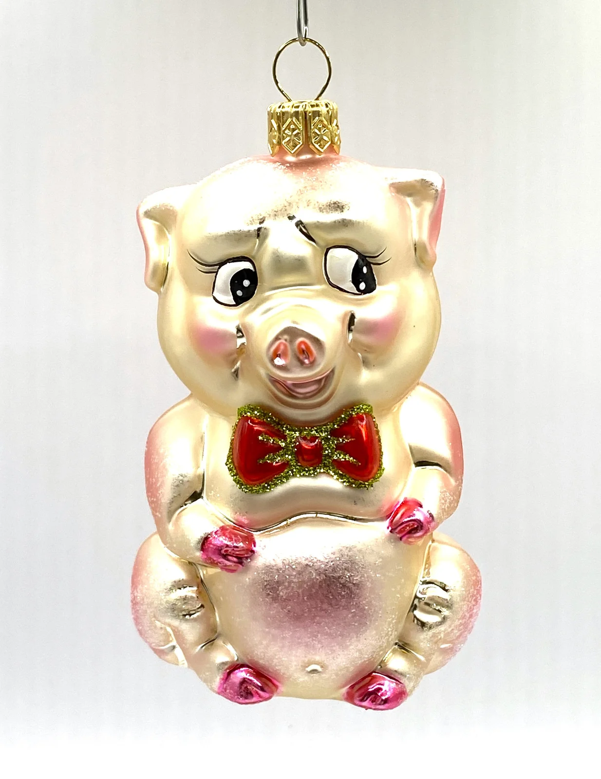 Sonstige Schweinchen mit rosa Schleife