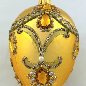 Hanco Goldens Faberge-Ei barock mit Volant und goldenen Schmucksteinen