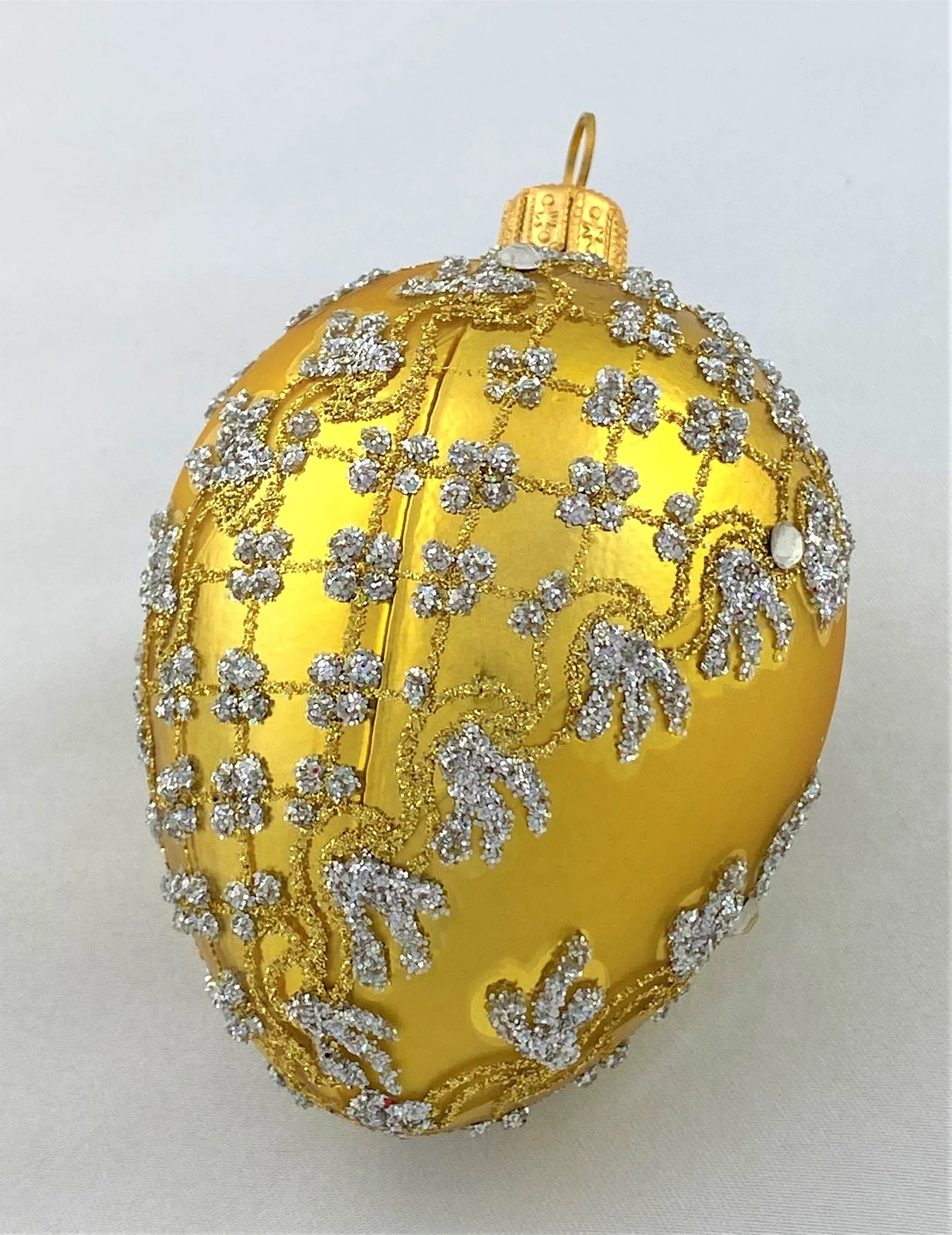 Hanco Goldenes Faberge-Ei mit silbernem Barock-Muster