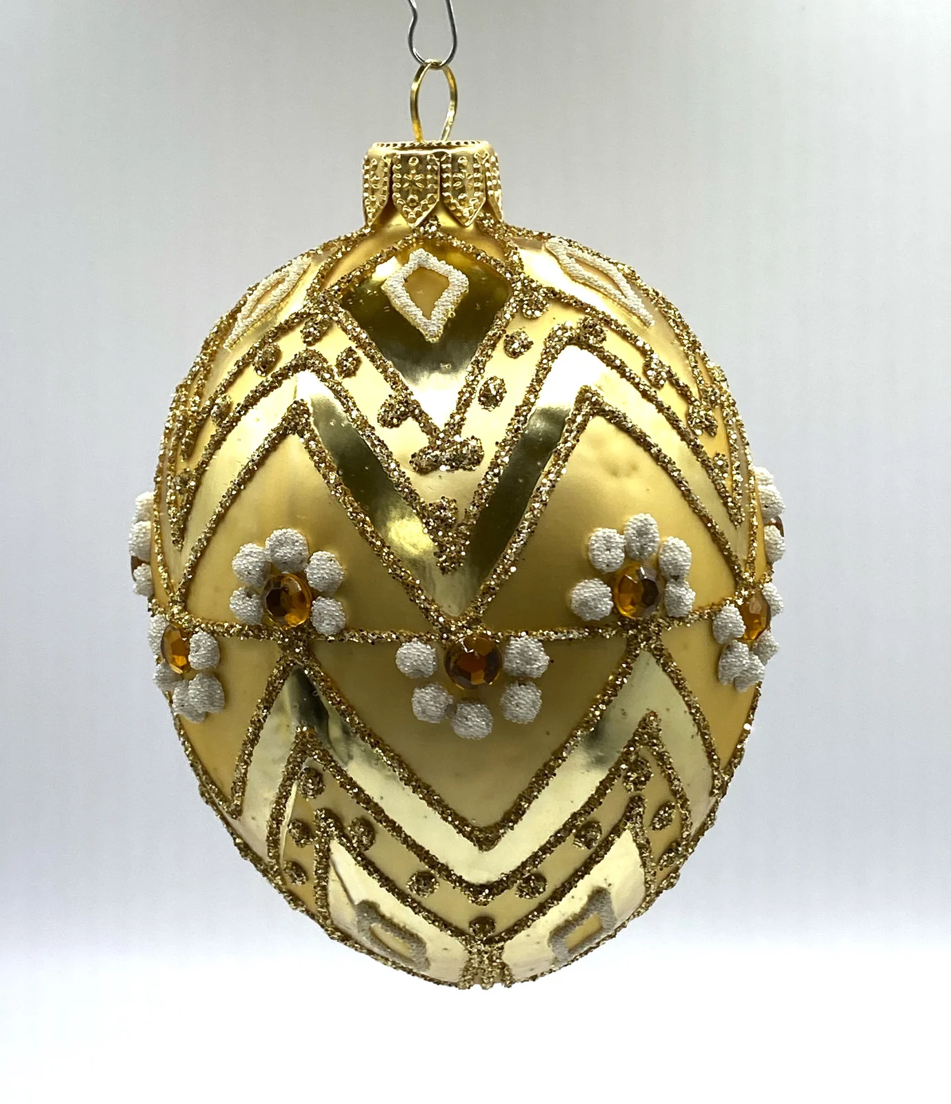 Dagmara Ei-Form gold mit Zackendekor