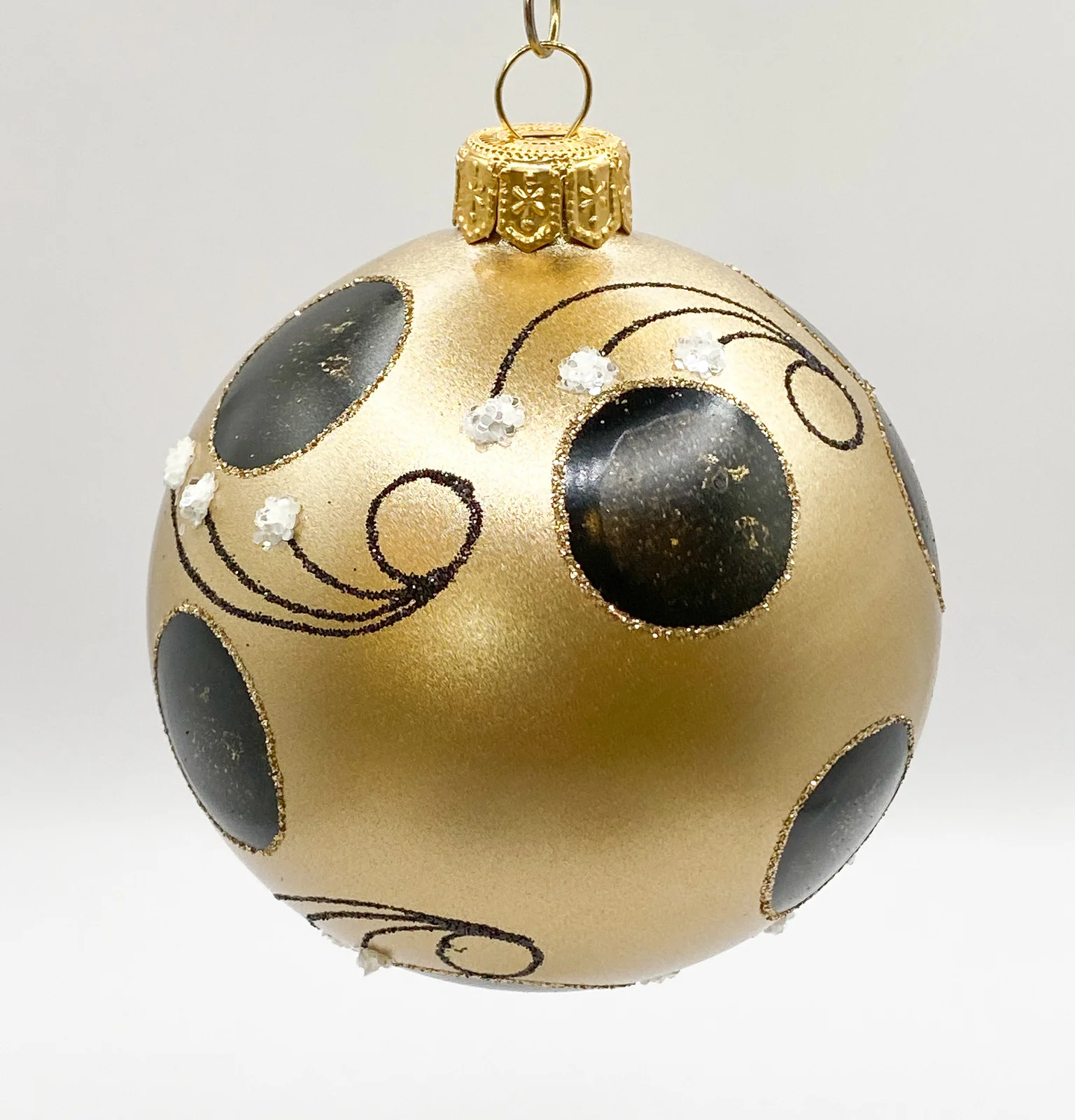 GMC Kugel gold matt mit schwarzem Dekor