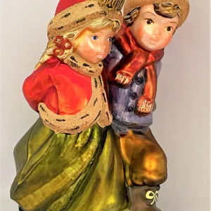 Komozja Mädchen und Junge laufen Schlittschuh, KOMOZJA MOSTOWSKI