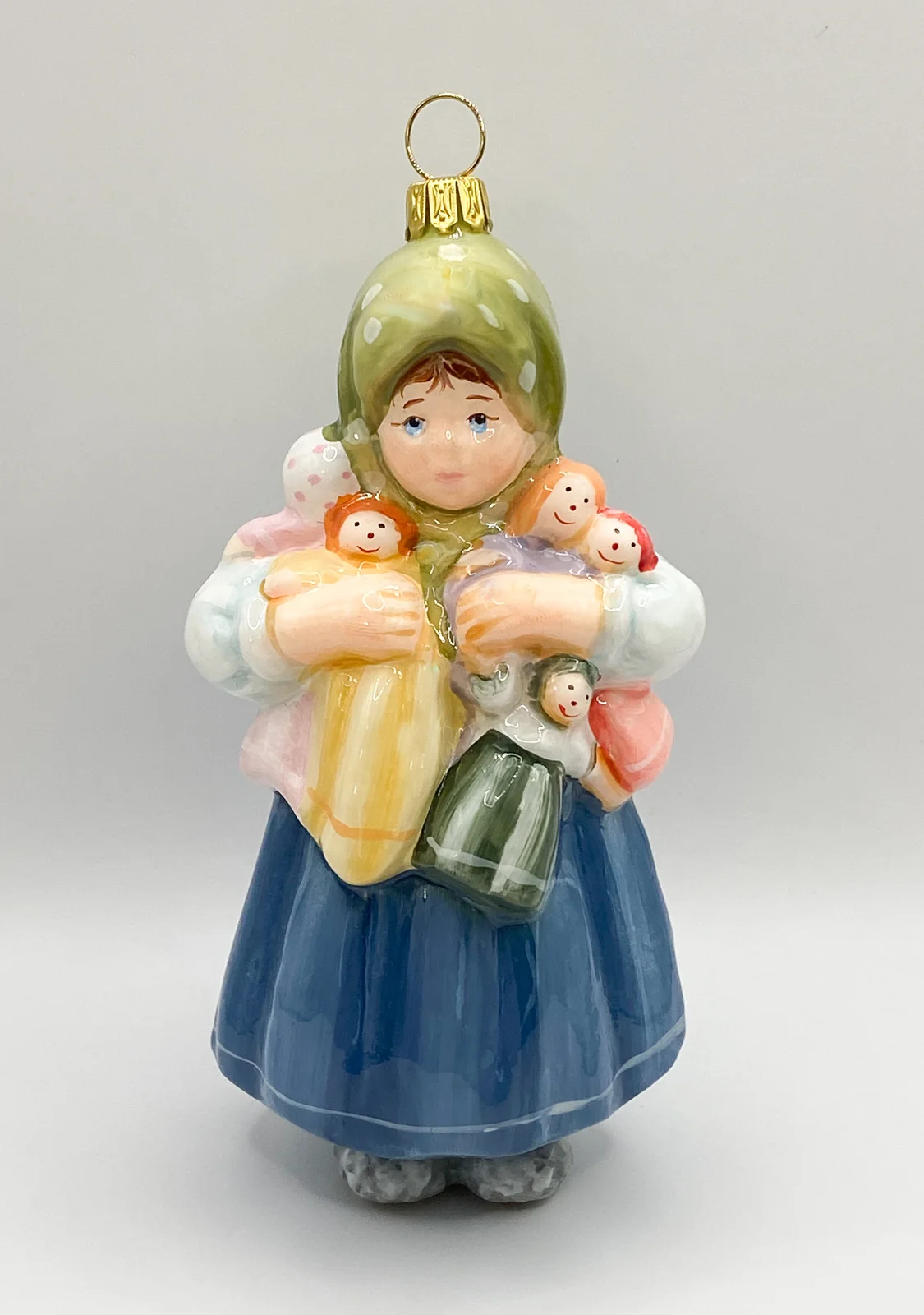 Komozja Das Mädchen spielt mit vielen Puppen, KOMOZJA MOSTOWSKI