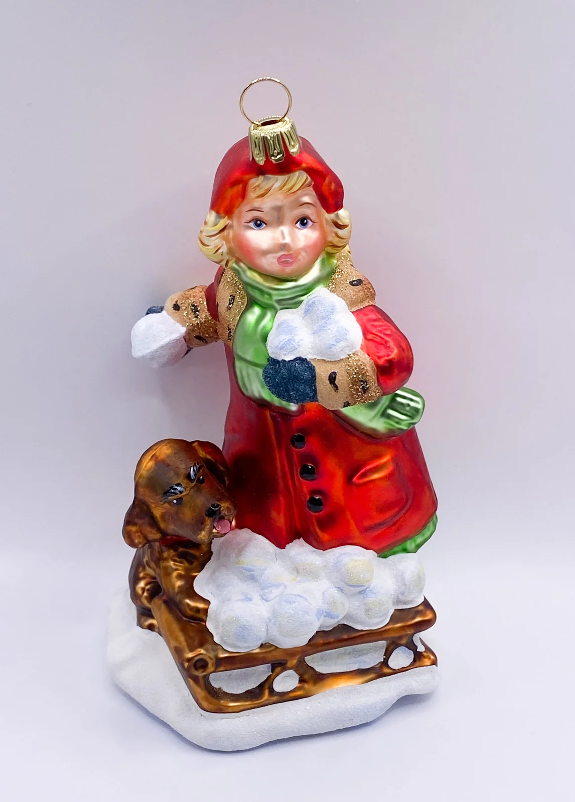 Komozja Das Mädchen macht mit dem Hund eine Schneeball-Schlacht KOMOZJA MOSTOWSKI