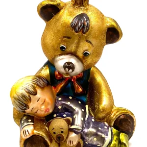 Komozja Kind im Pyjama schläft in Teddy-Bärs Armen, KOMOZJA MOSTOWSKI