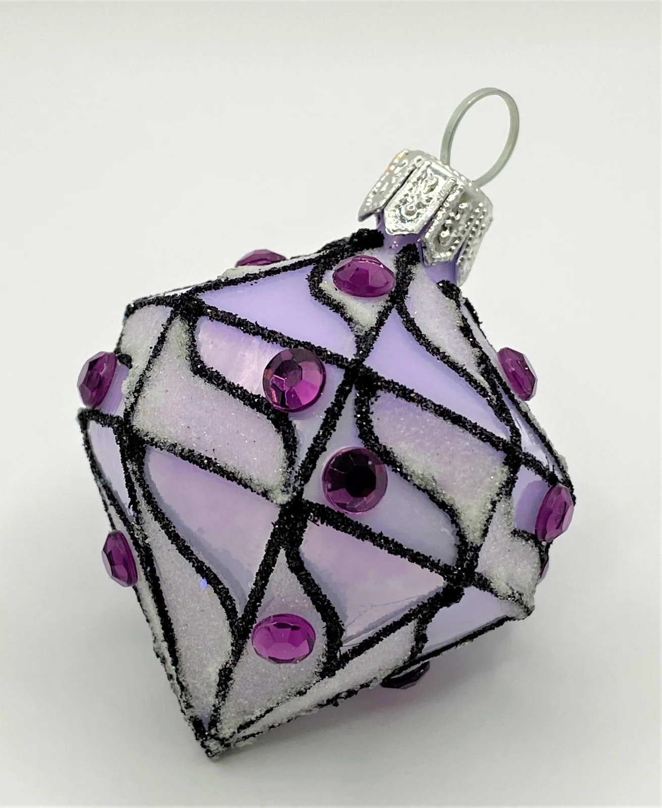 Szklo Lilafarbenes Kreisel-Ornament mit violetten Schmucksteinen