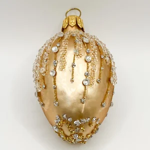 Szklo Kleines goldenes Ei mit Schmucksteinen