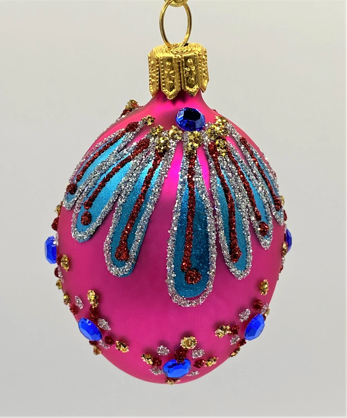 Szklo Kleines Ei pink mit blauen Schmucksteinen