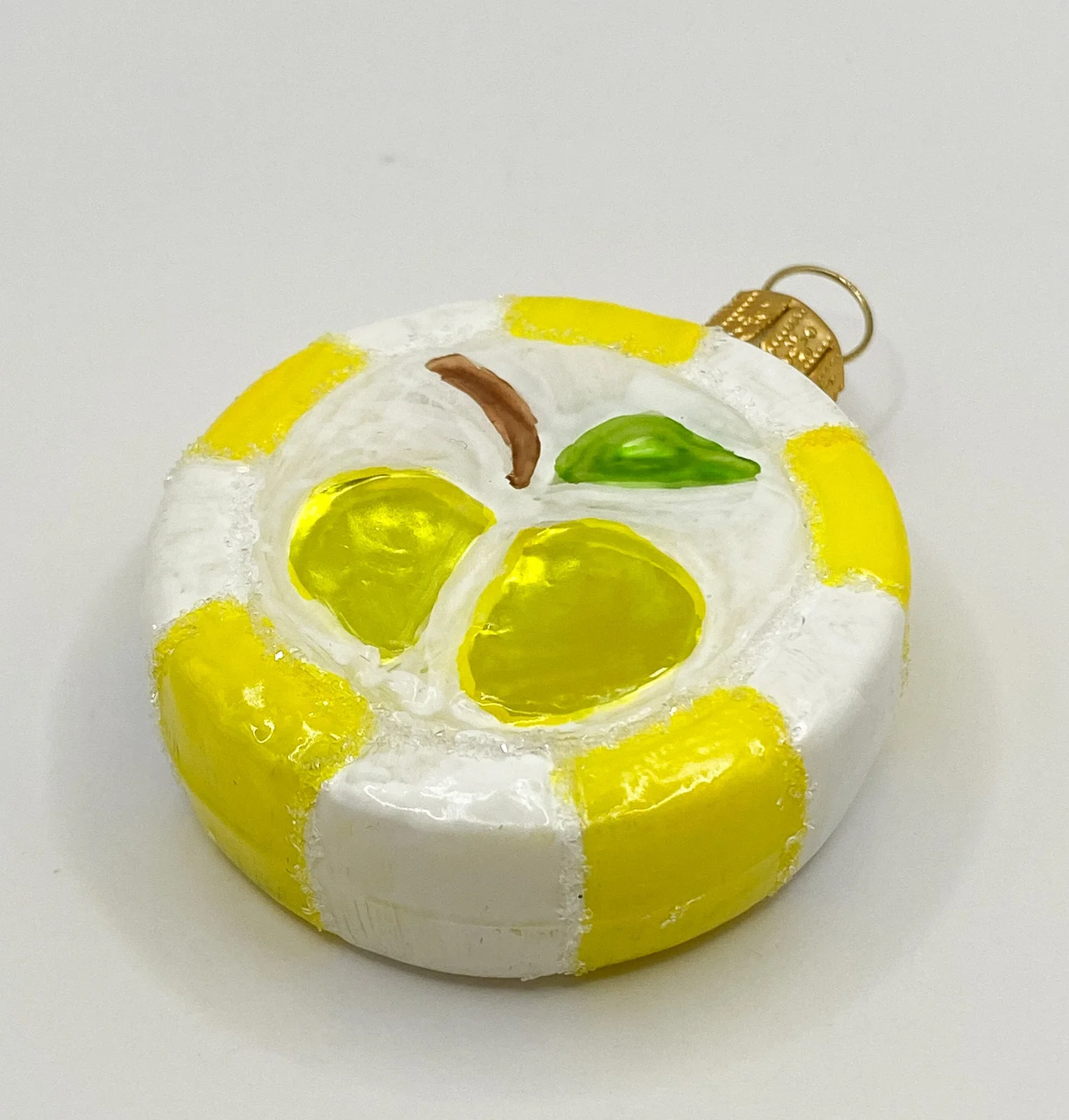 GMC Gelber Bonbon mit Apfel-Motiv