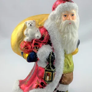 Glassware Der Weihnachtsmann stapft mit der Laterne in der Hand daher