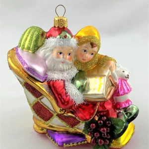 Glassware Weihnachtsmann liest dem Jungen eine Weihnachtsgeschichte vor