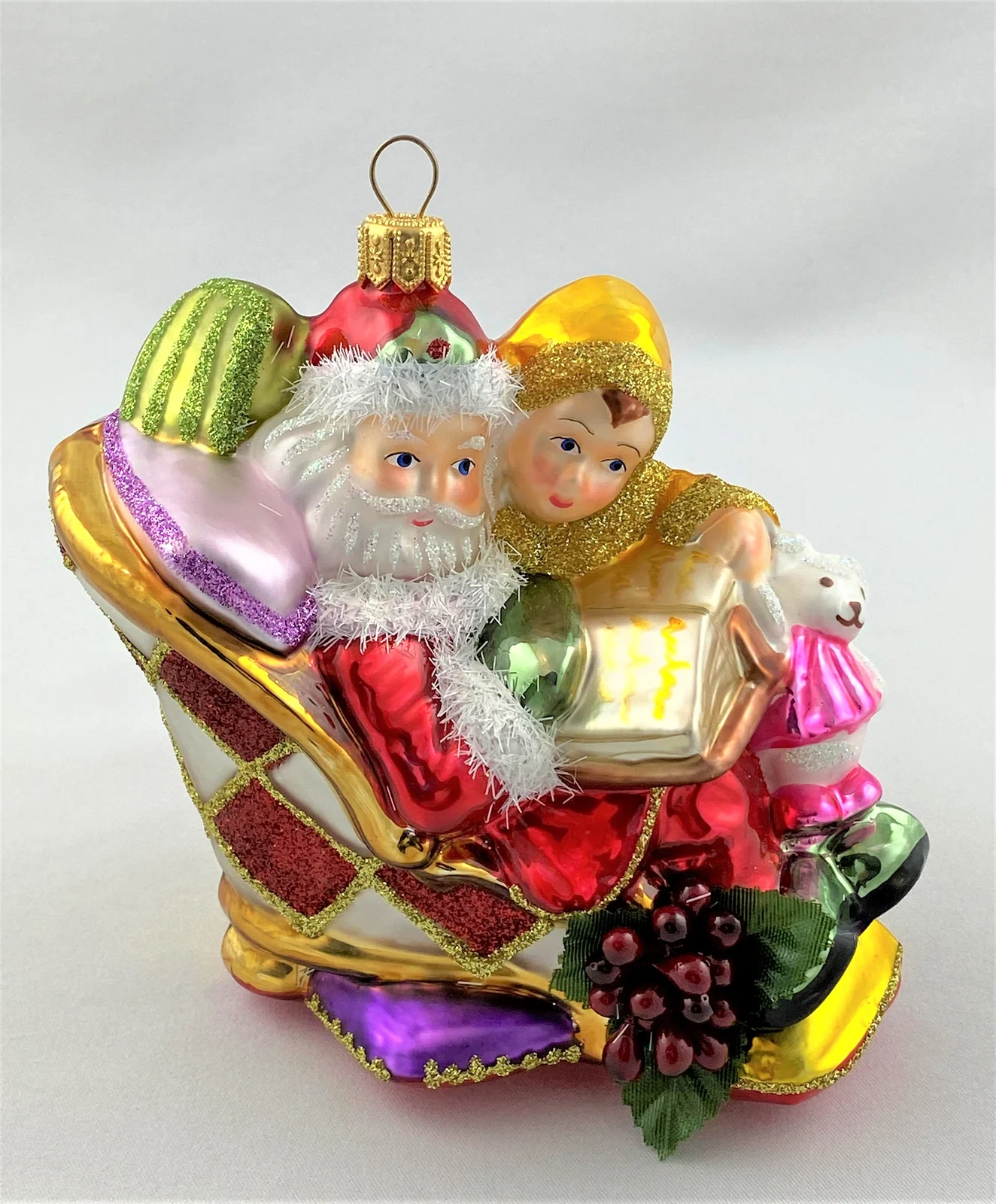 Glassware Weihnachtsmann liest dem Jungen eine Weihnachtsgeschichte vor