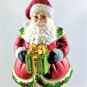 Hanco Weihnachtsmann auf Kugel und Ilex-Dekor am Mantel