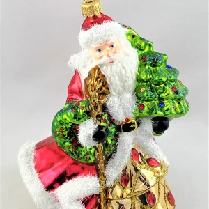Glassware Der Weihnachtsmann im edlen Gewand bringt den Christbaum