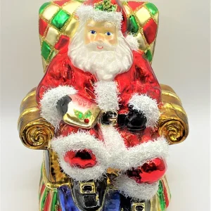 Glassware Weihnachtsmann liest die Geschenk-Liste der Kinder