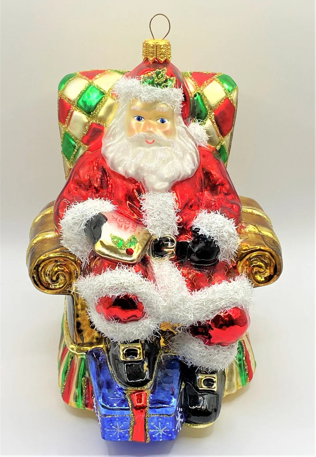 Glassware Weihnachtsmann liest die Geschenk-Liste der Kinder