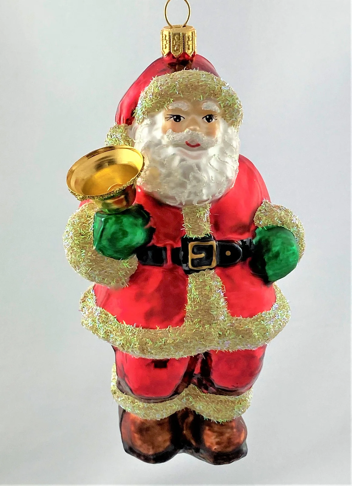 Hanco Weihnachtsmann ruft die KInder mit der Glocke zur Bescherung