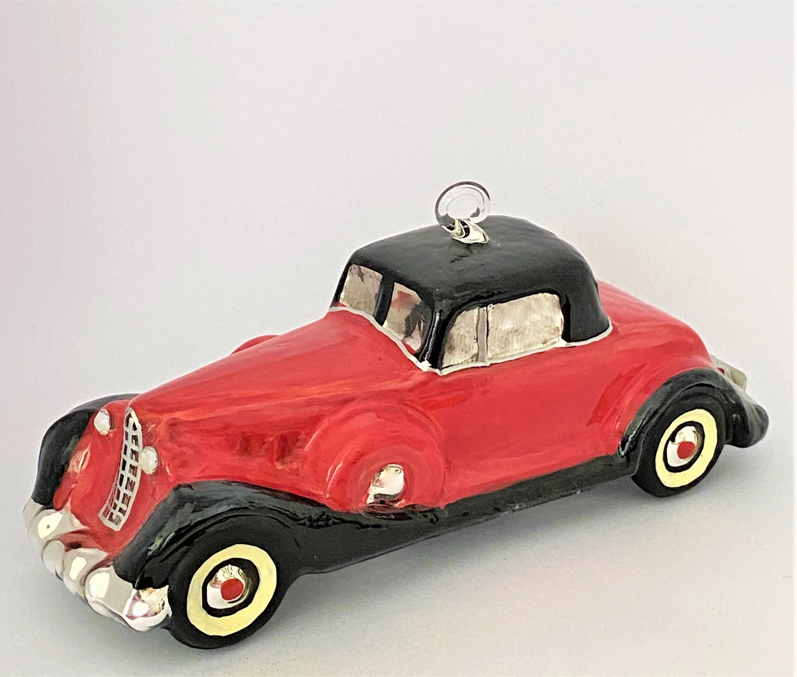 Komozja Rotes Oldtimer-Coupe mit schwarzem Dach, KOMOZJA MOSTOWSKI