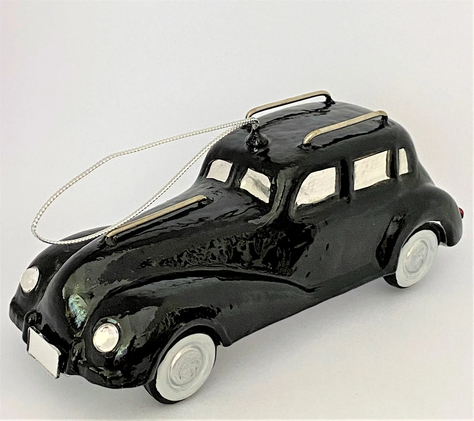 Komozja Schwarze Oldtimer Limousine, KOMOZJA MOSTOWSKI