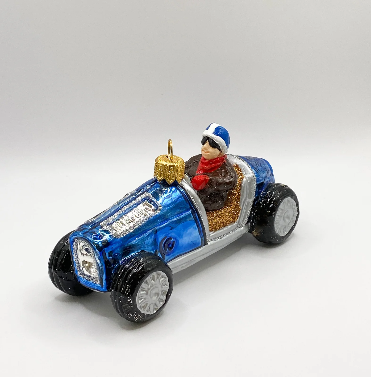 Koronex Blaues Oldtimer Rennauto mit britischer Flagge