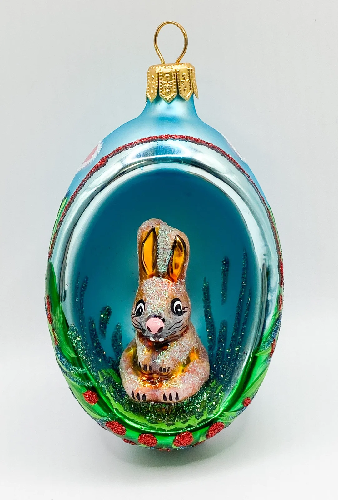 Wiktoria Offenes Osterei blau mit Hase