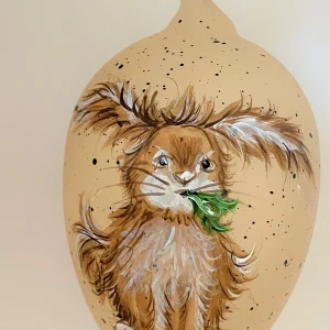 Dagmara Hellbraunes Osterei mit witzigem Osterhase