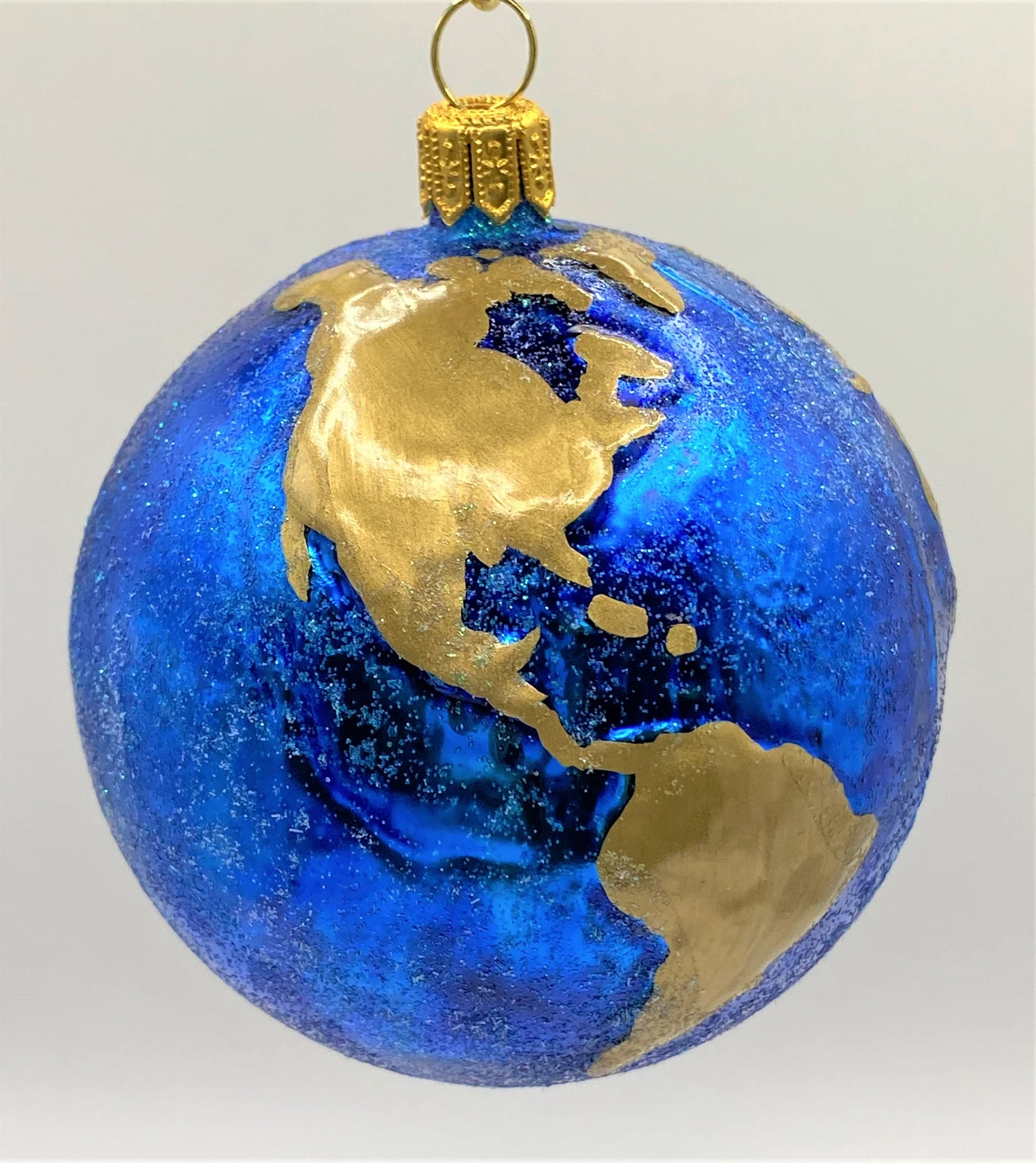 Wiktoria Planet Erde mit goldenen Kontinenten