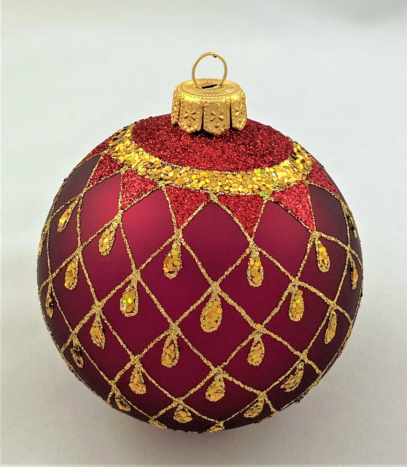 GMC Kugel bordeaux rot mit Gold-Gittermuster