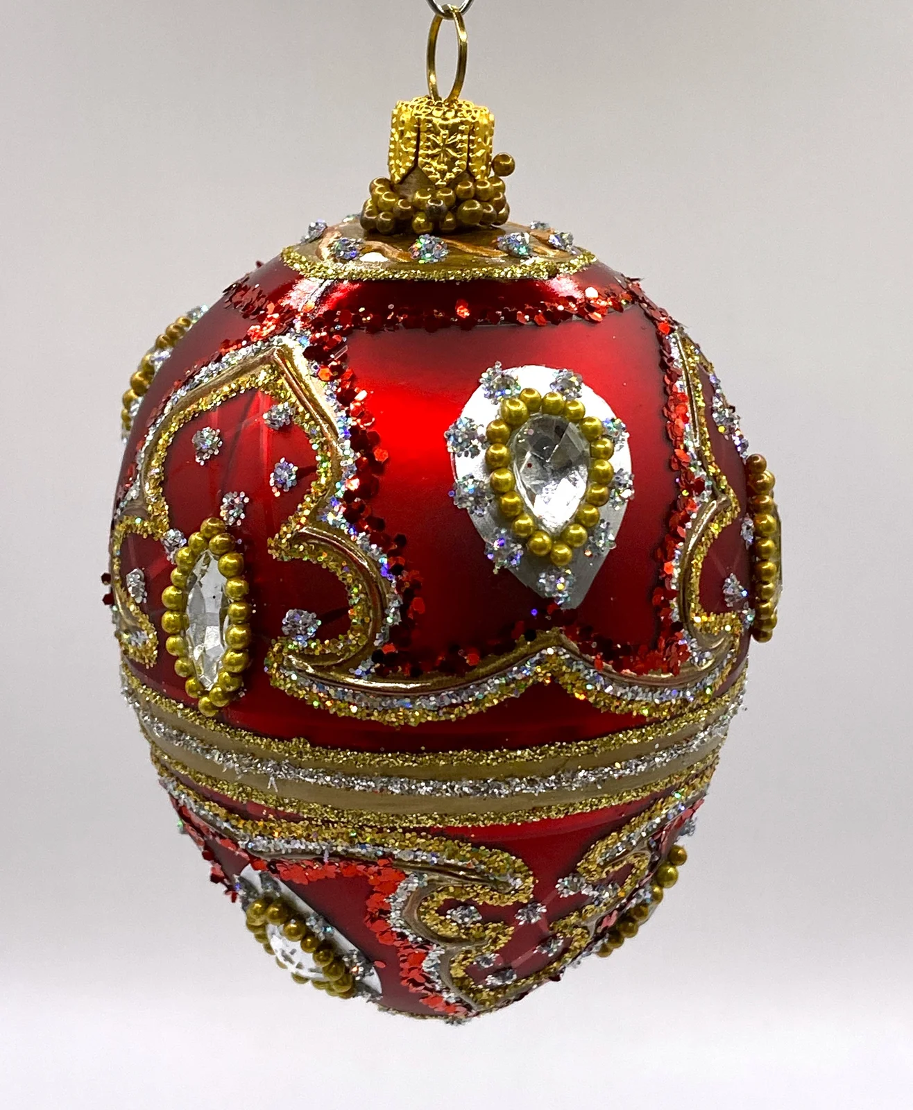 Hanco Faberge-Ei warmes Rot mit Barock Muster, silberne Steine