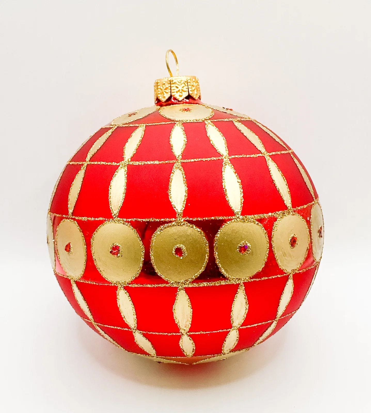 GMC Rote Kugel mit goldenem Art-Deco Muster