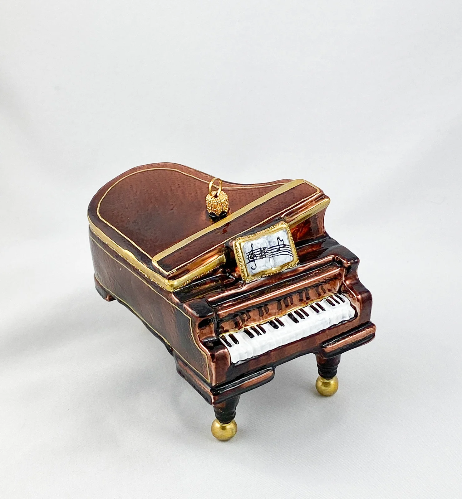 GMC Brauner Flügel oder Piano