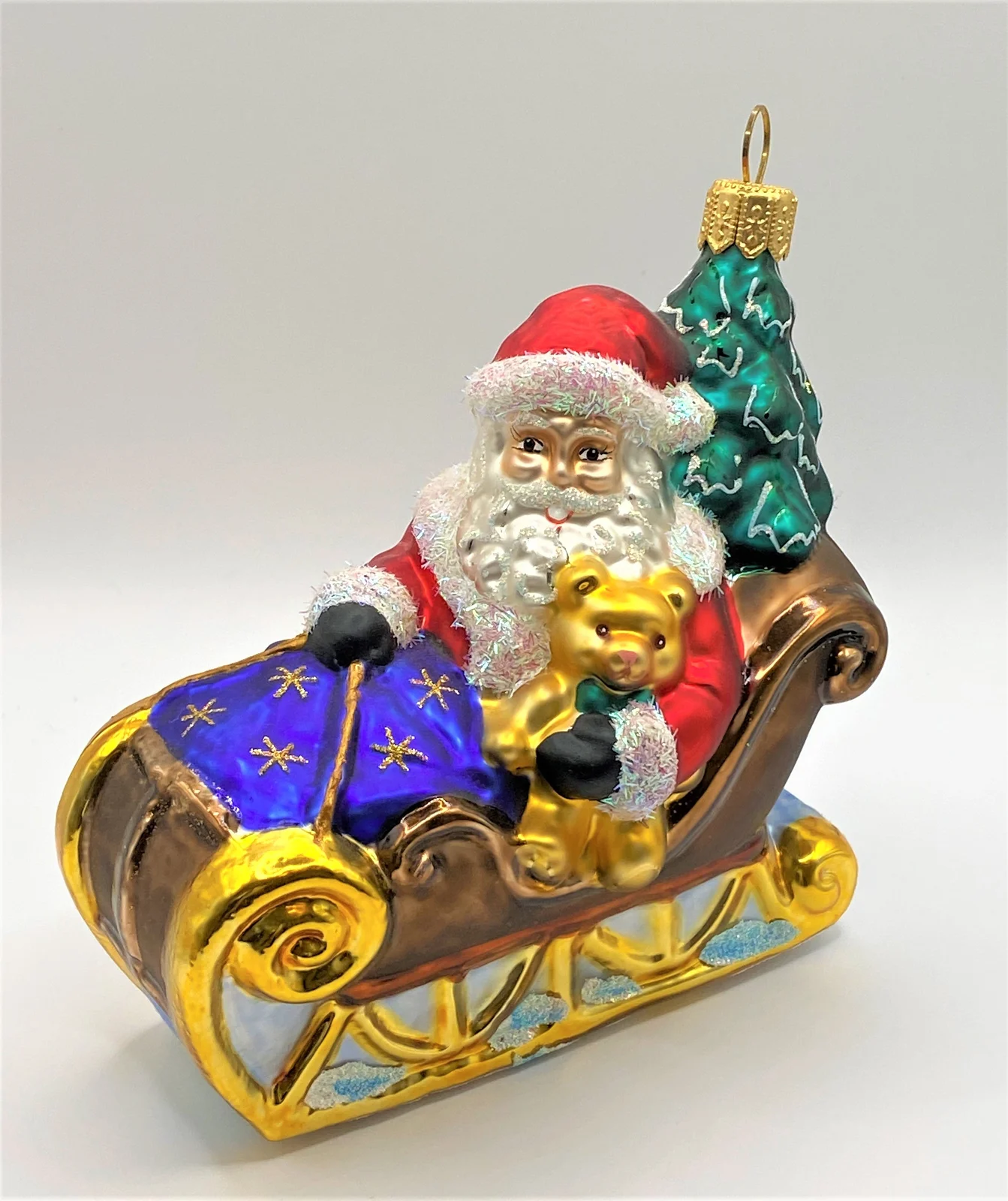 Hanco Weihnachtsmann bringt den Christbaum mit dem Schlitten, Sternchendecke