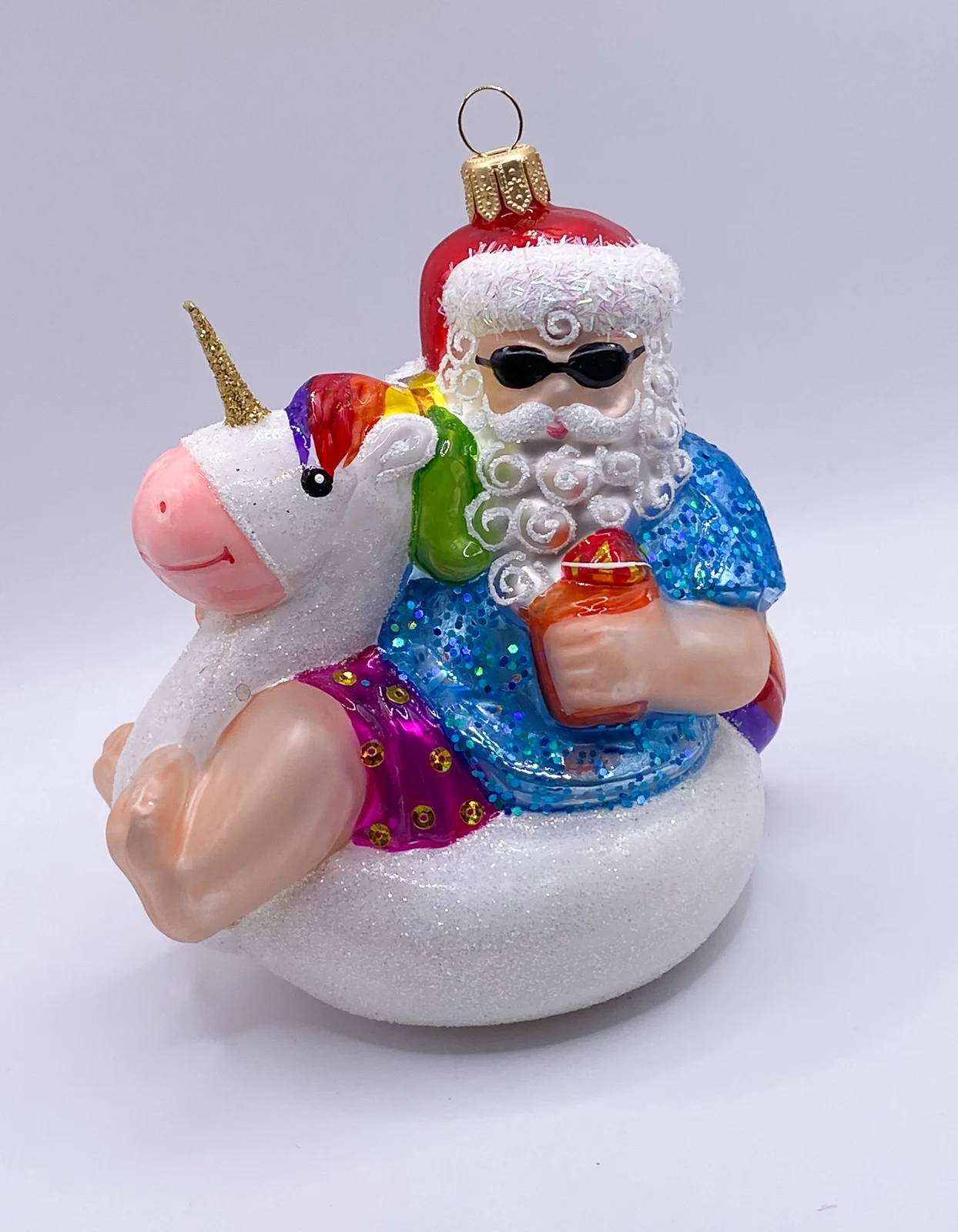 Impuls Santa Claus macht Pause mit der Einhorn-Luftmatratze
