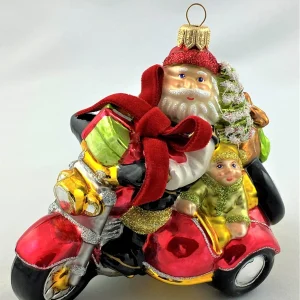 Glassware Weihnachtsmann und Wichtel bringen die Geschenke mit dem Seitenwagen-Motorrad